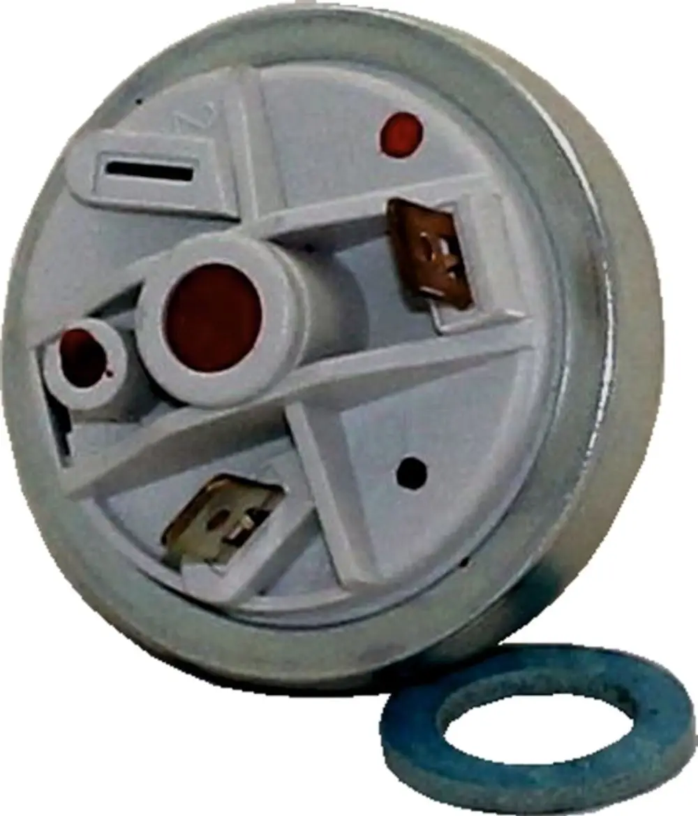Druckwächter von Wolf, rund mit mehreren Anschlüssen und O-Ring. Der Mechanismus zur Überwachung des Heizwasserdrucks ist deutlich erkennbar.